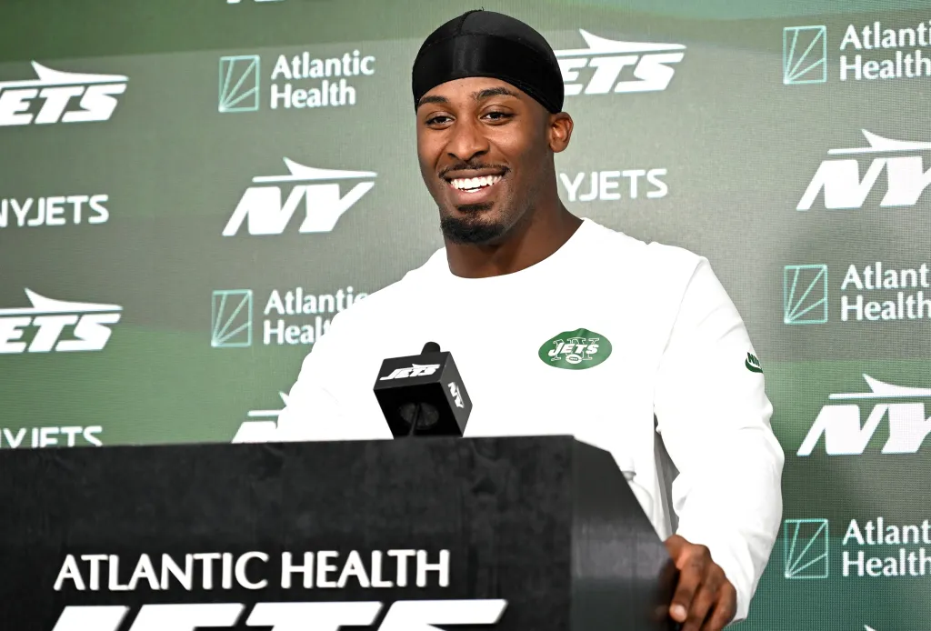 A smiling Breece Hall talks to reporters during Jets minicamp on June 16, 2026.