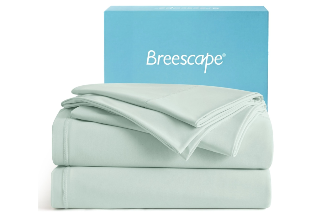 Breescape light green bedding set with folded sheets and a box.