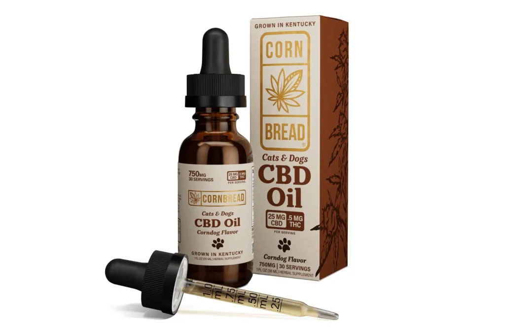 A bottle of CBD for dog, its dropper and its box.