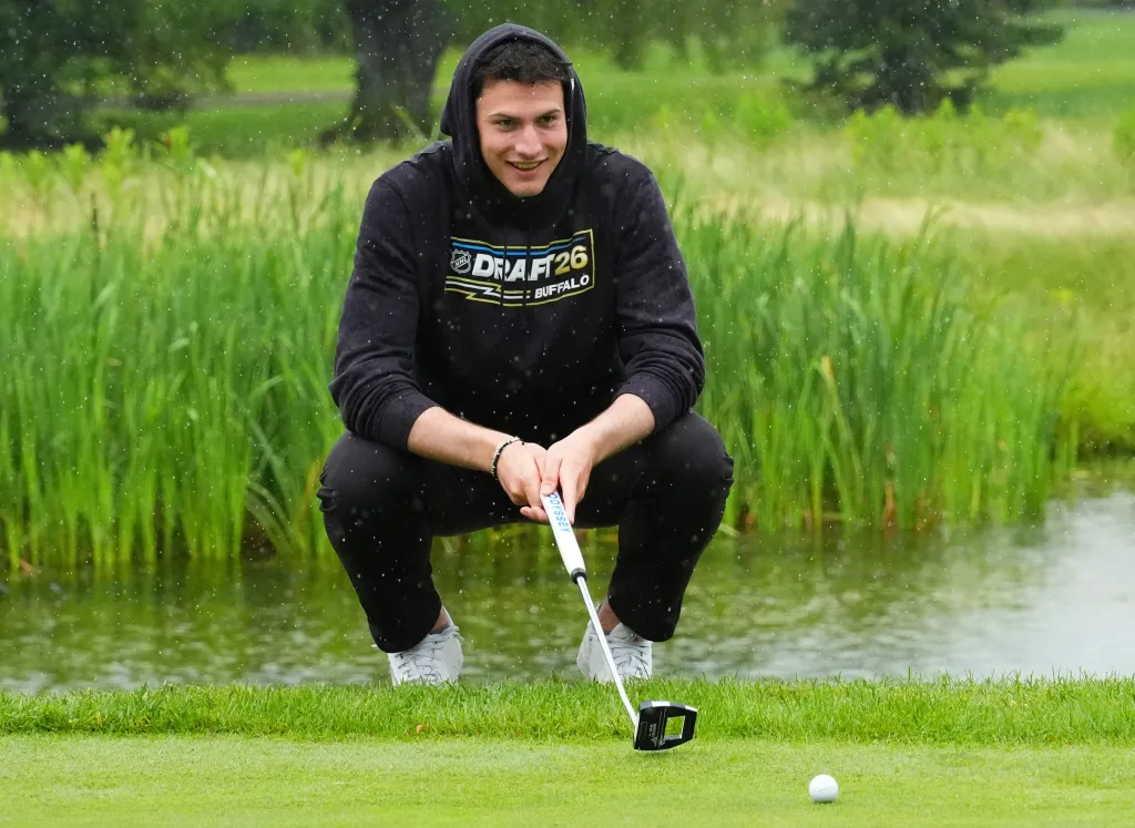 Ethan Belchetz plays a shot at the 2026 NHL Draft Top Prospects Golf Outing on June 25, 2026 in Buffalo
