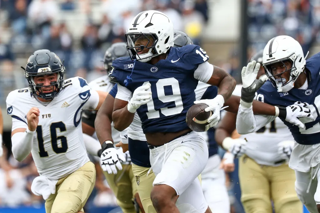 Chaz Coleman #19 of the Penn State Nittany Lions runs with the ball after a strip sack fumble against the FIU Panthers during the fourth quarter at Beaver Stadium on September 6, 2025 in State College, Pennsylvania. 
