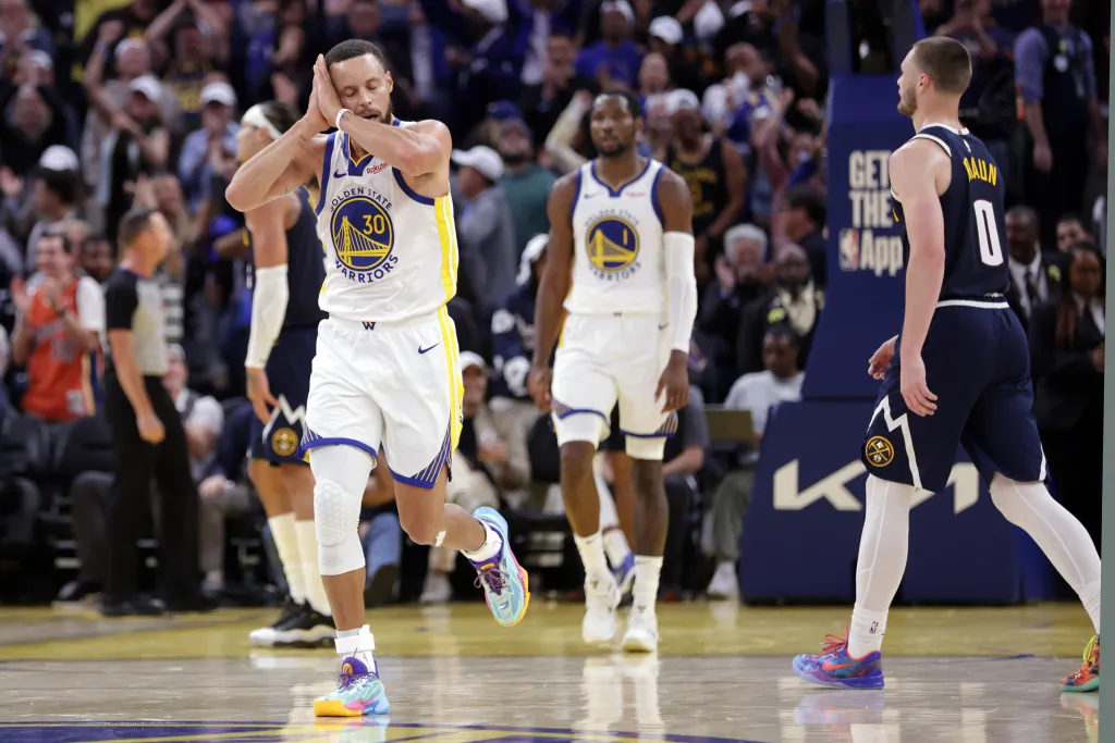 Stephen Curry of the Golden State Warriors performs his "night night" celebration.