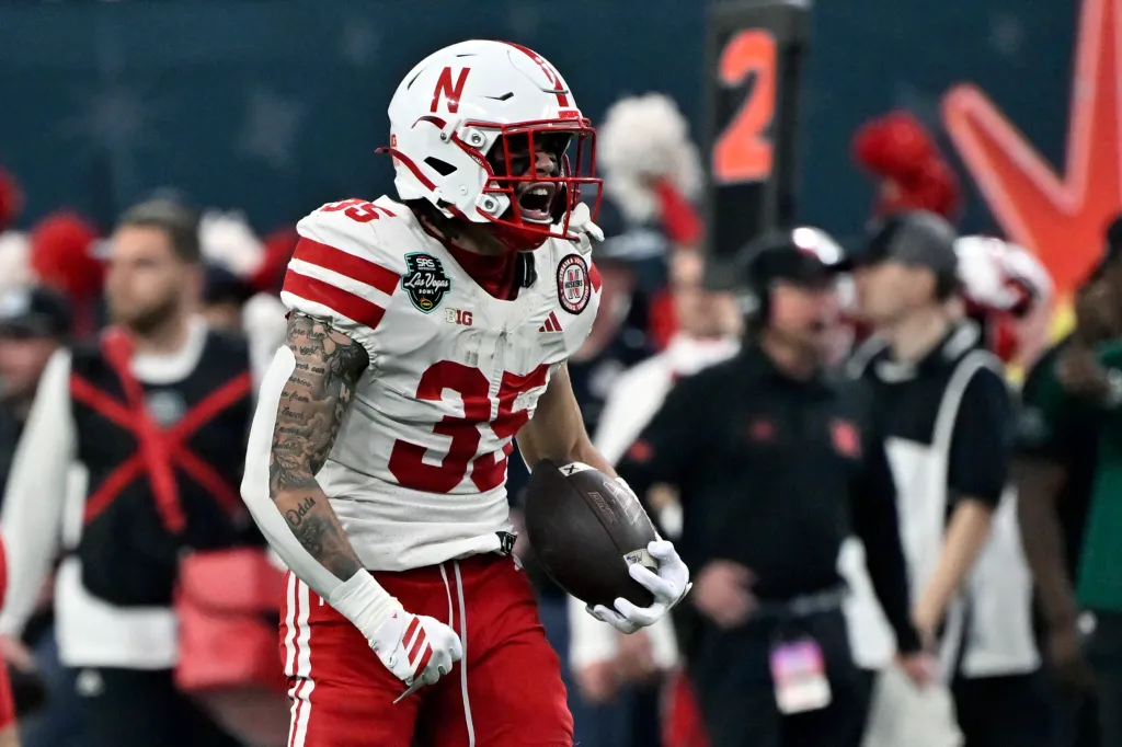 Nebraska Cornhuskers player AJ Rollins holding a football during the SRS Distribution Las Vegas Bowl.