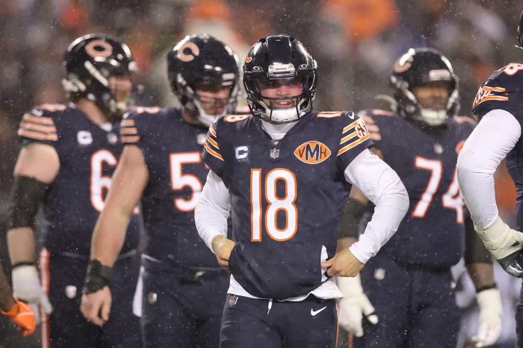 Caleb Williams #18 of the Chicago Bears looks on against the Los Angeles Rams in the NFC Divisional Playoffs at Soldier Field on January 18, 2026 in Chicago, Illinois.
