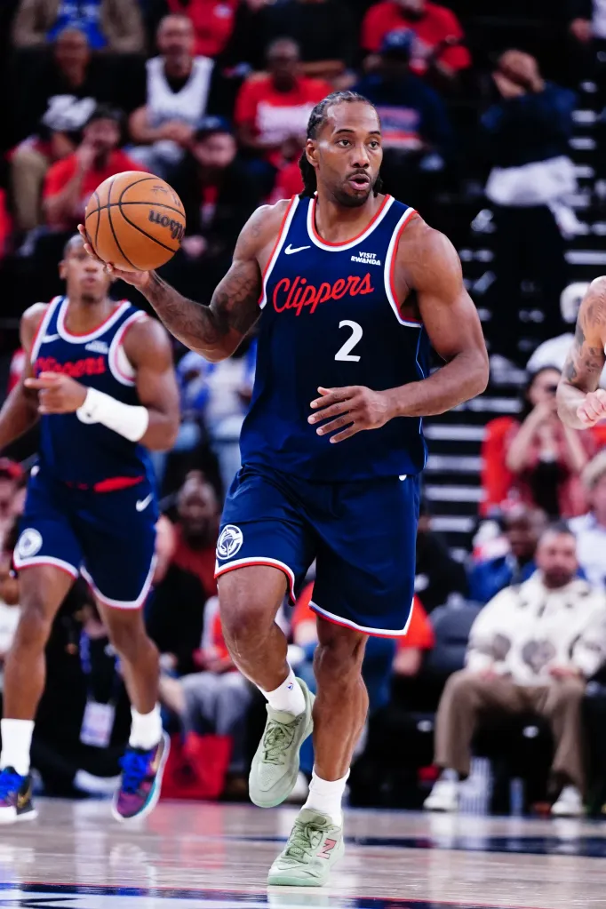 Kawhi Leonard of the LA Clippers dribbles the ball during a game.