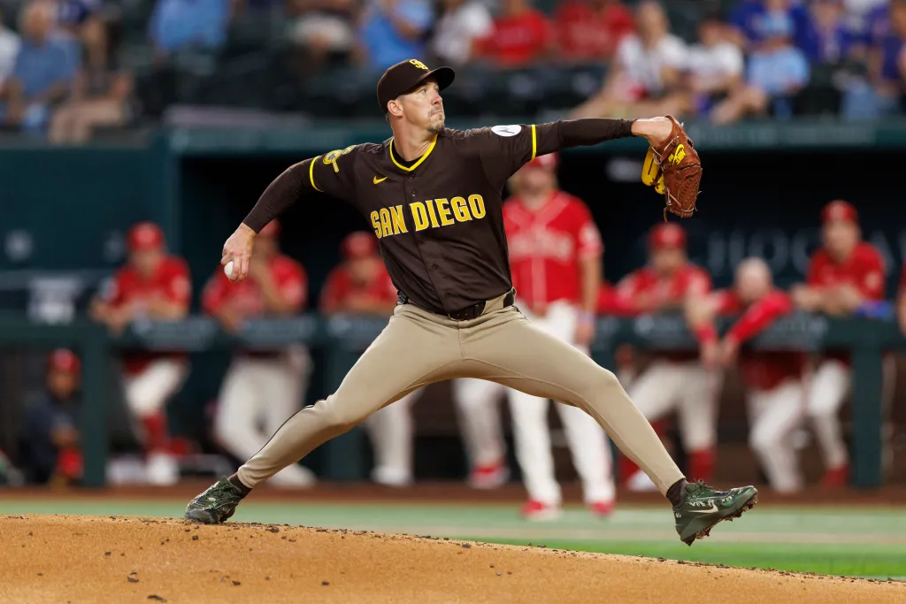San Diego Padres pitcher Walker Buehler mid-pitch against the Texas Rangers.