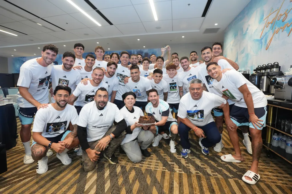 The Argentina National Football Team celebrates Lionel Messi's birthday with a cake.