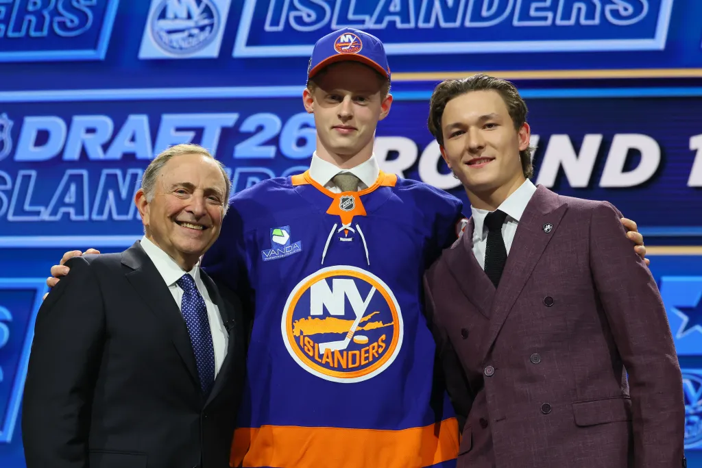 NHL Commissioner Gary Bettman and Matthew Schaefer of the New York Islanders looks on as Malte Gustafsson of Sweden is drafted by the New York Islanders with the thirteenth overall pick during day one of the 2026 NHL Draft on June 26, 2026 in Buffalo, New York.