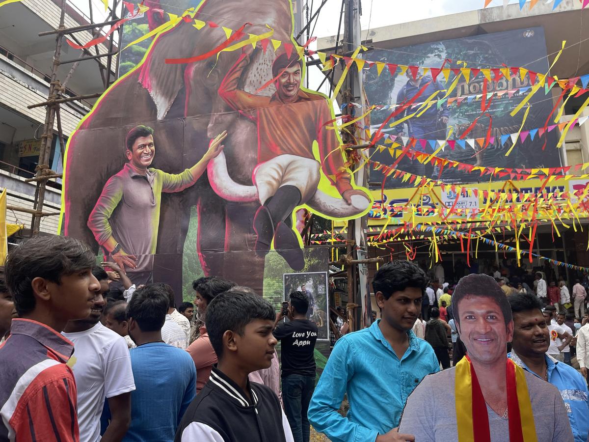 Fans of the late Sandalwood superstar Puneeth Rajkumar, during the release of his last Kannada movie ‘Gandhada Gudi’, in Bengaluru.