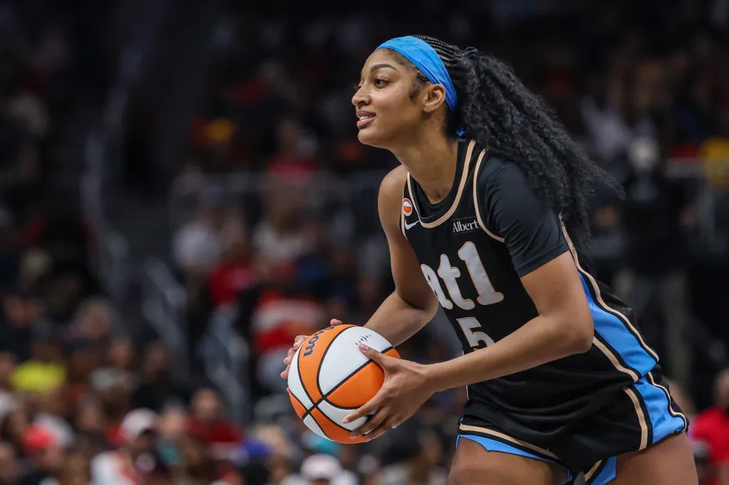 Atlanta Dream forward Angel Reese (5) looks for a pass against the Indiana Fever during the fourth quarter at State Farm Arena.