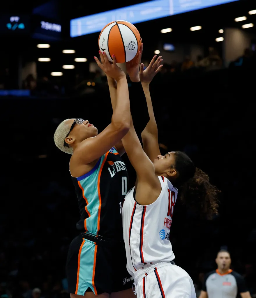 Washington Mystic guard Cassandre Prosper (R) blocks New York Liberty power forward Satou Sabally in the first half at the Barclays Center in Brooklyn, New York, USA, Friday, June 19, 2026. 