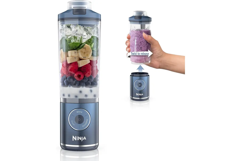 Ninja Blast portable blender with fruit and ice inside, and a hand demonstrating how to release the cup.