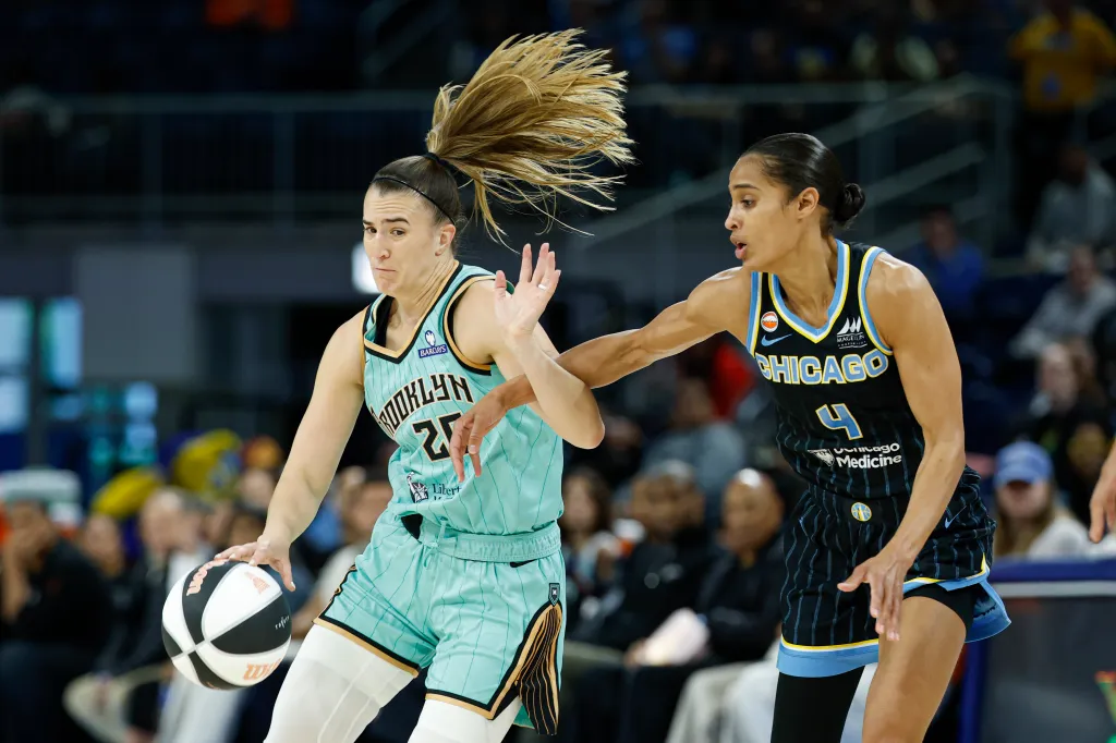 Sabrina Ionescu, who later scored the game-winning layup, drives on Skylar Diggins during the Liberty's 96-95 win over the Sky on June 17, 2026 in Chicago.
