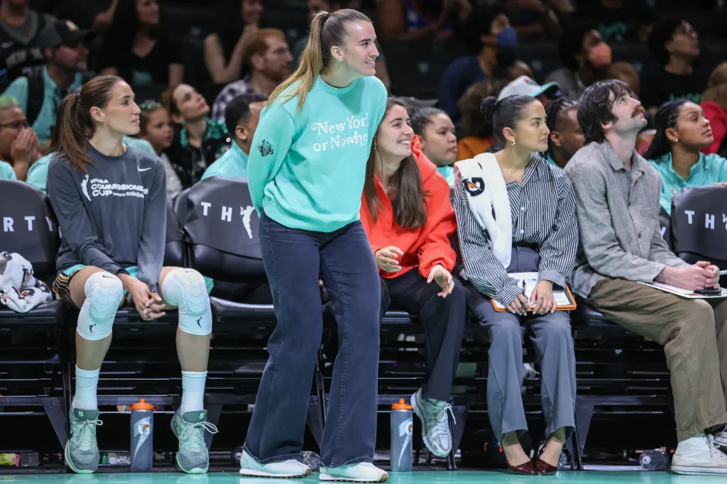 Sabrina Ionescu, standing up to watch the action during the Liberty's win over the Tempo on June 3, 2026, is expected to return to the lineup on Sunday vs. the Washington Mystics.
