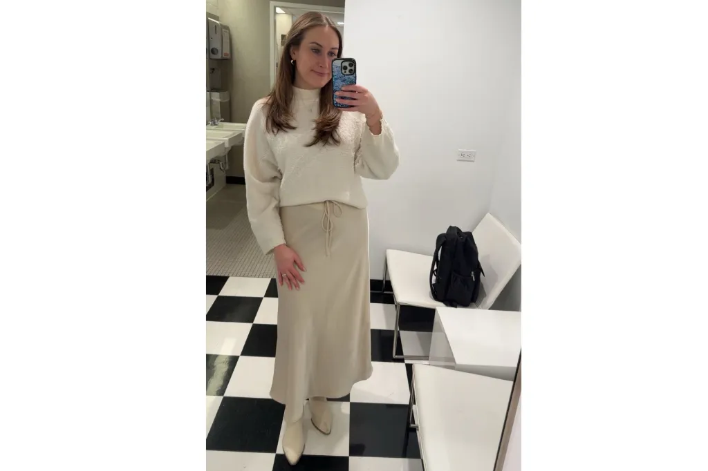 A woman in a silk skirt.