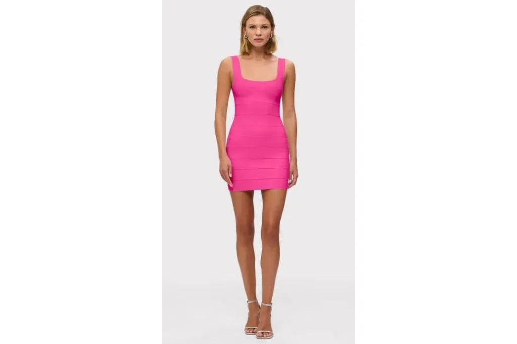A woman in a hot pink dress.
