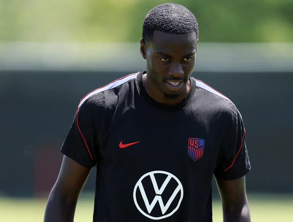 Tim Weah taks a break during a USMNT training session on June 16, 2026 in Irvine, Calif.