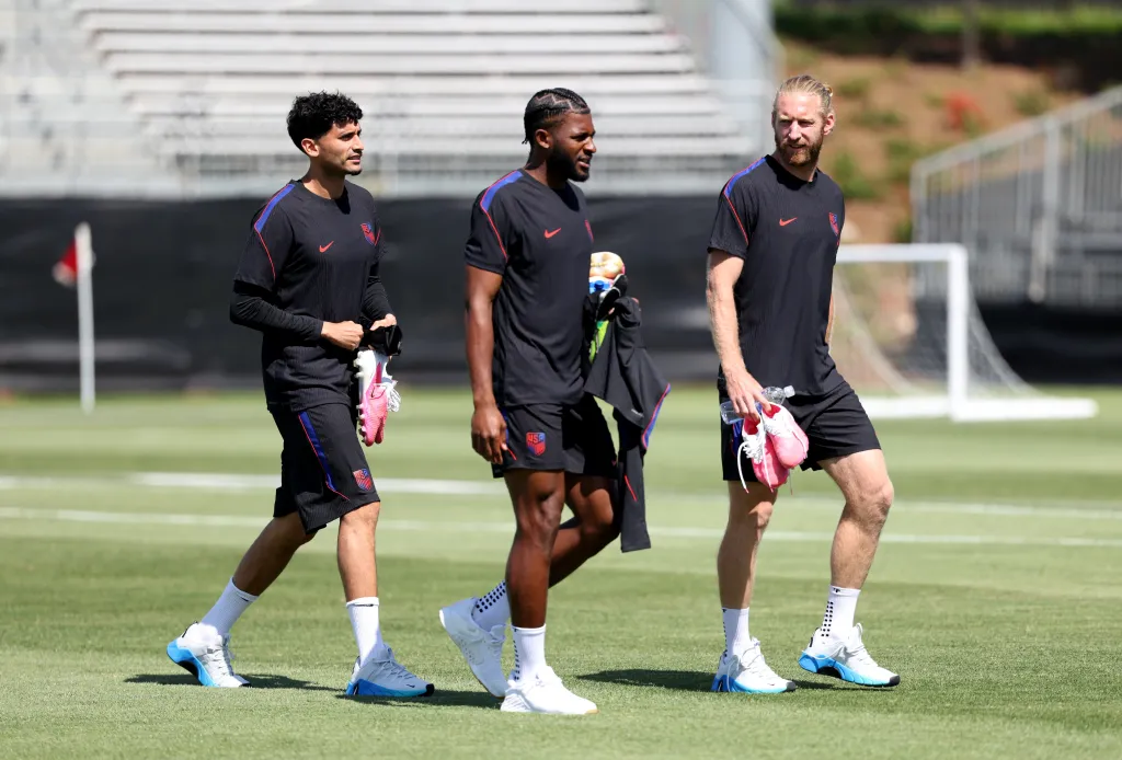 Tim Ream of the U.S., Ricardo Pepi of the U.S. and Mark McKenzie of the U.S. during training.