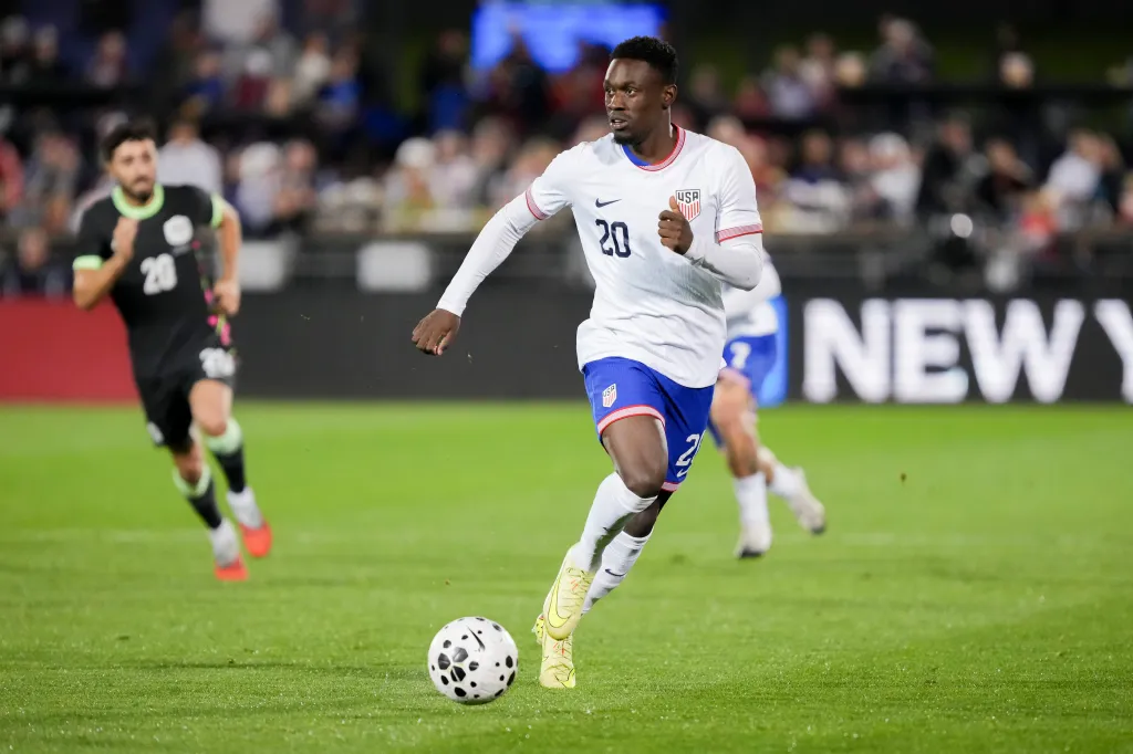 Folarin Balogun, who scored two goals in the USMNT's World Cup-opening win over Paraguay, moves the ball up field during Team USA'a friendly win over Australia this past October. The two teams meet again on Friday.