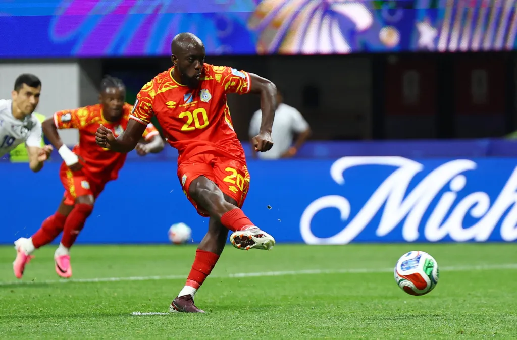 Yoanne Wissa scores on a penalty shot for the first of his two goals in Congo's knockout stage-clinching 3-1 win over Uzbekistan in the World Cup on June 27, 2026 in Atlanta.