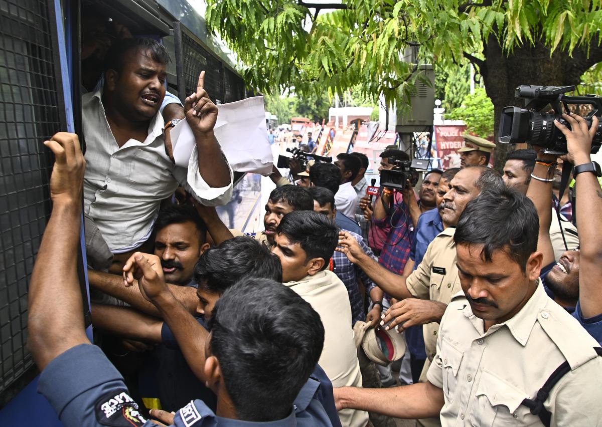 Police detain Students' Federation of India (SFI) members during a protest near Lok Bhavan in Hyderabad on Monday, June 29, 2026.
