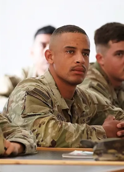 Adrian Bonsey, a combat engineer assigned to the 3rd Infantry Division, in his army fatigues at Fort Stewart, Georgia.