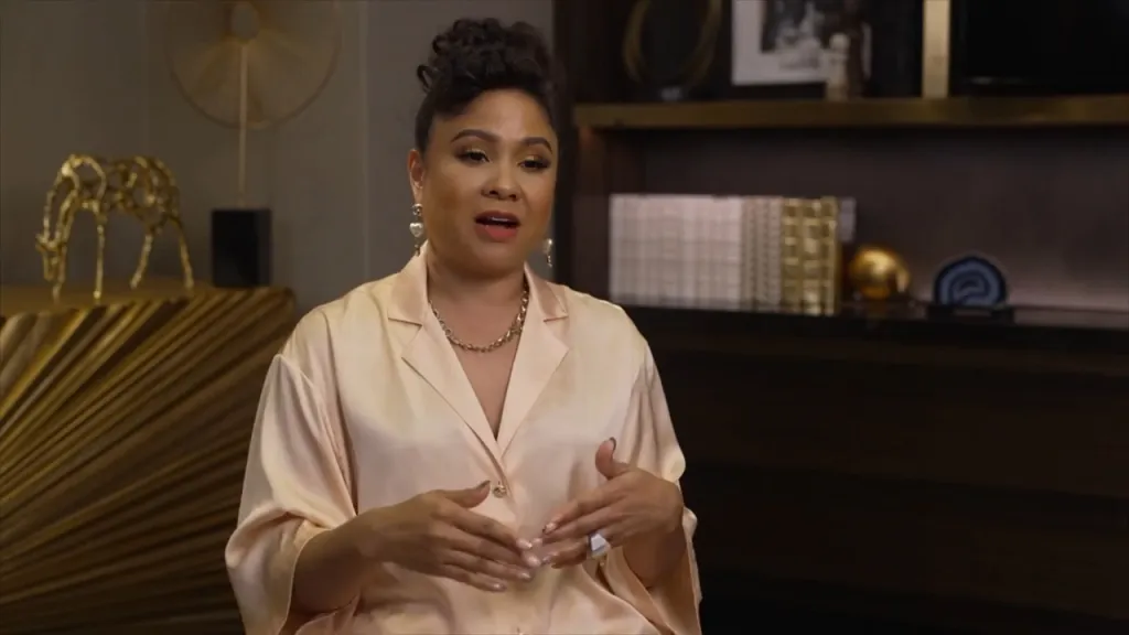 Angela Yee speaking about the Milken Institute.