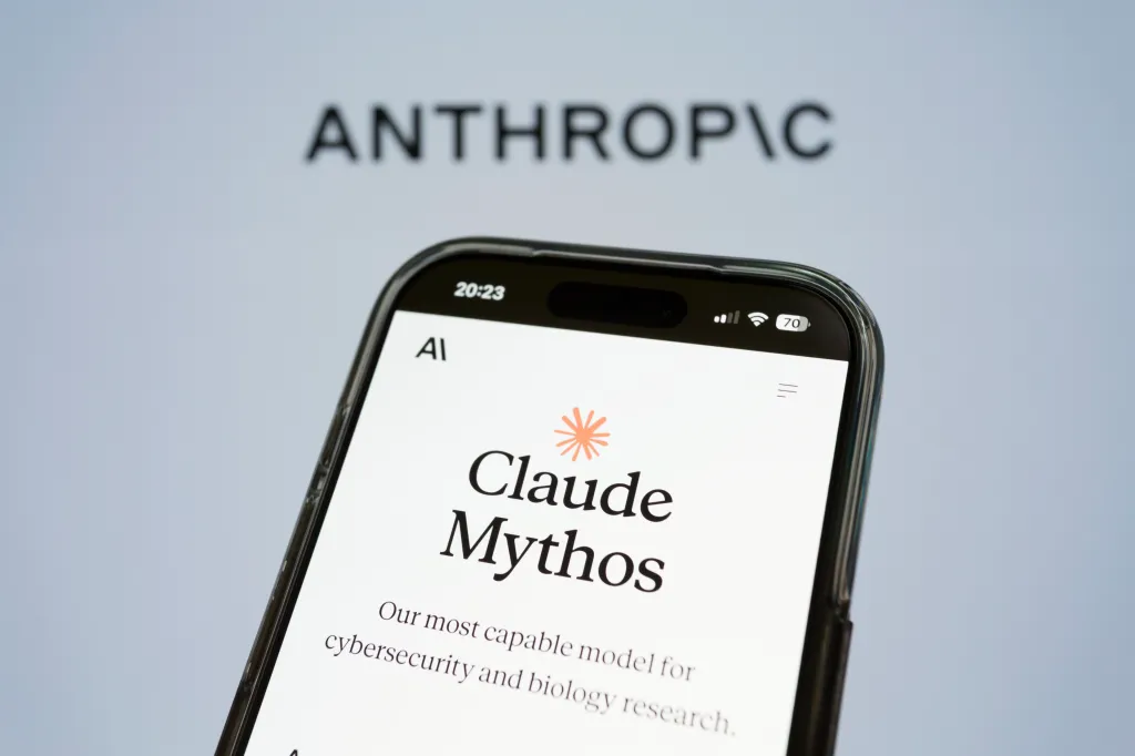 A smartphone displaying "Claude Mythos" by Anthropic on its screen.