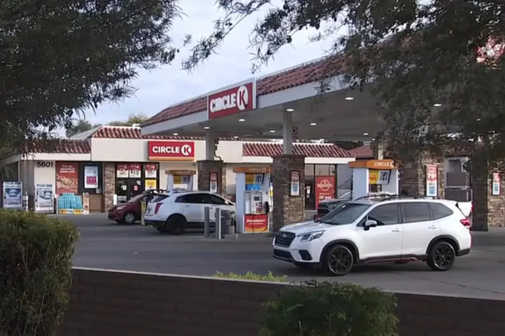 Circle K convenience store and gas station with cars parked at pumps.