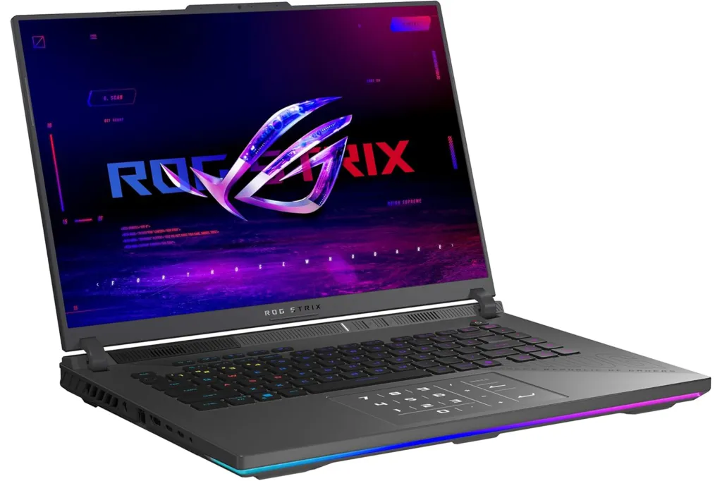 ASUS ROG Strix gaming laptop with an illuminated keyboard and glowing base.