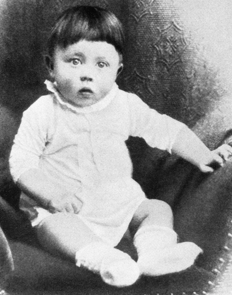 Black and white portrait of Adolf Hitler as an infant.