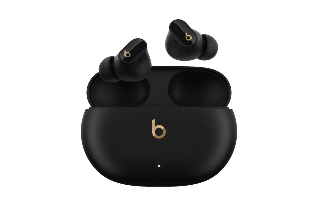 Beats earbuds in their charging case.