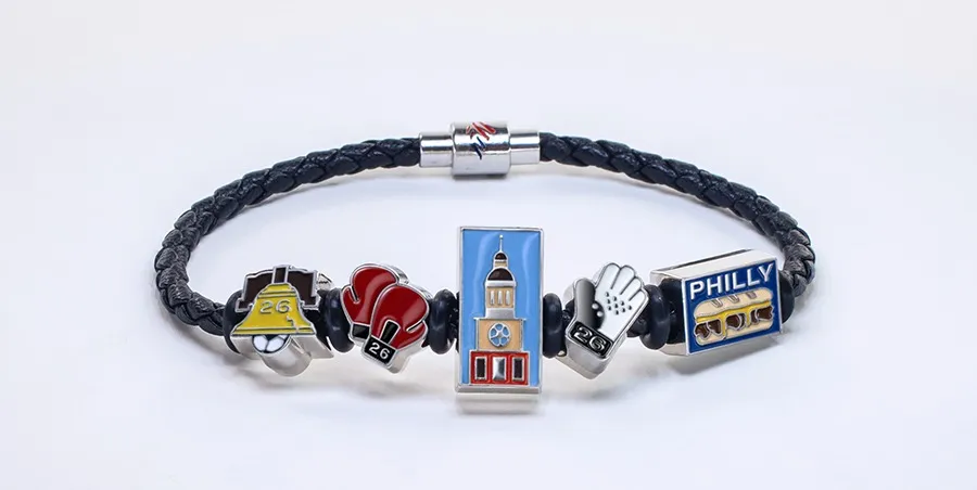 Bank of America Fan Band with charms representing the Liberty Bell, boxing gloves, Independence Hall, a baseball glove, and a Philly cheesesteak.