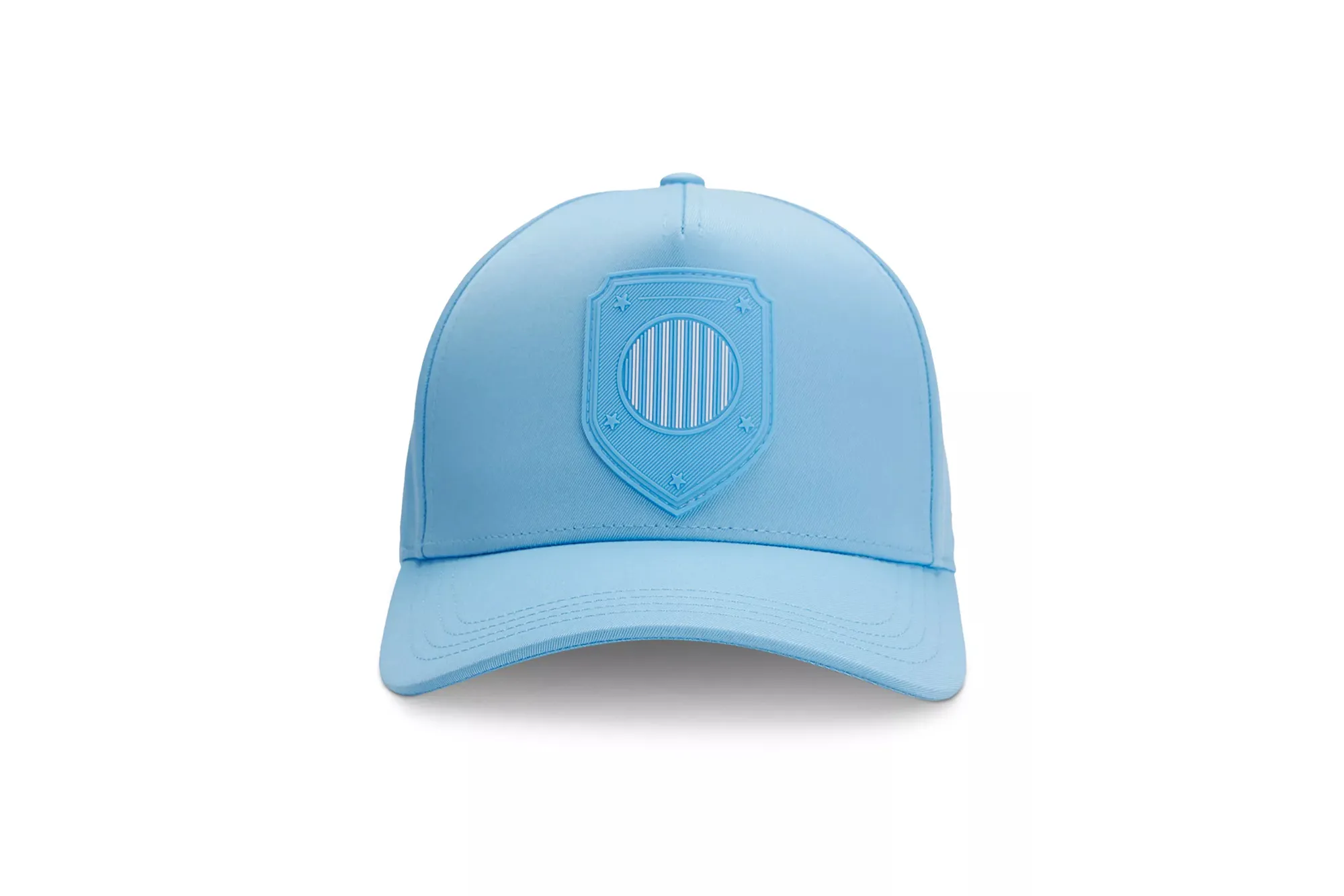 Light blue baseball cap with a light blue shield logo featuring vertical stripes and stars.