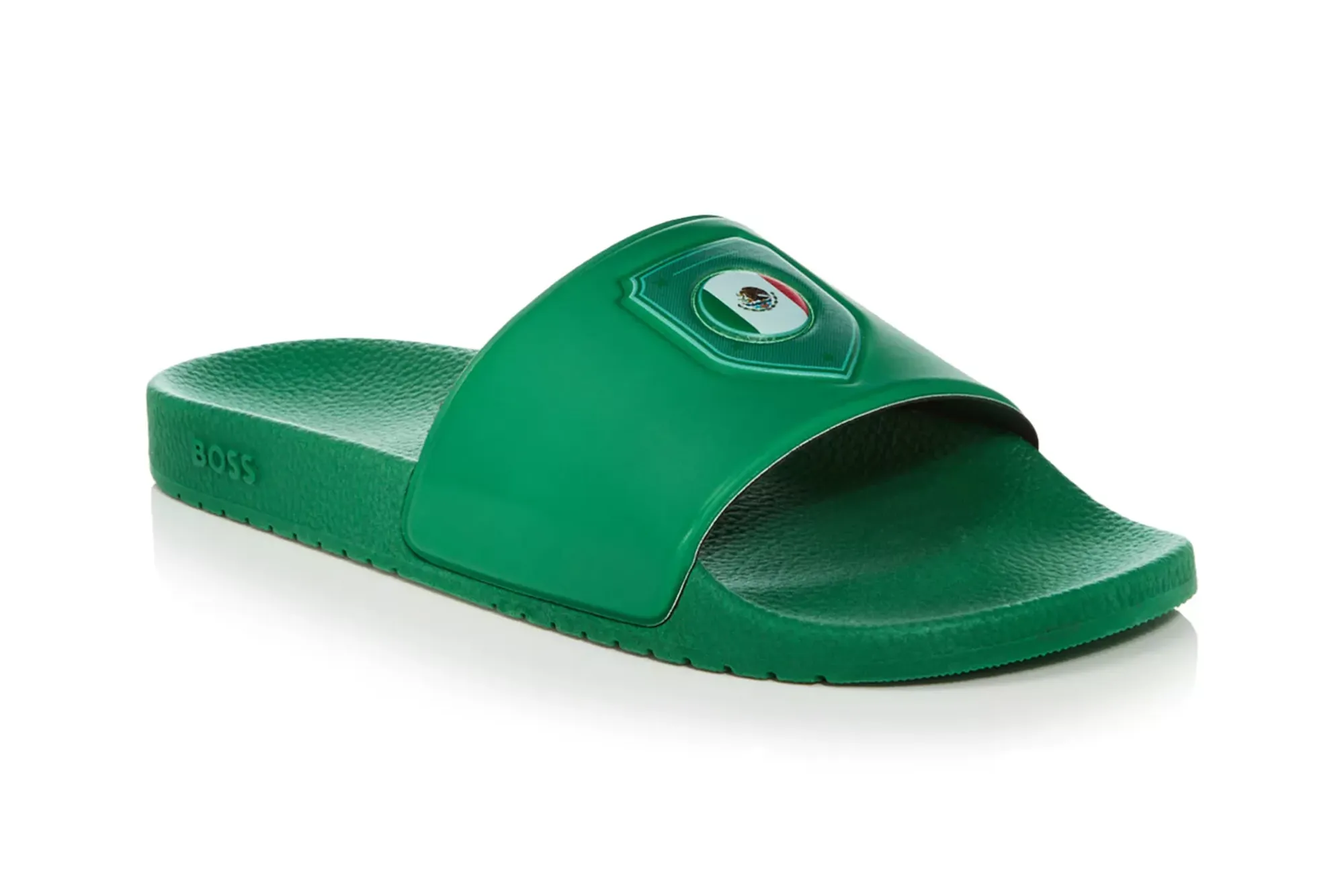 A green BOSS slide with a Mexican flag emblem on the strap.