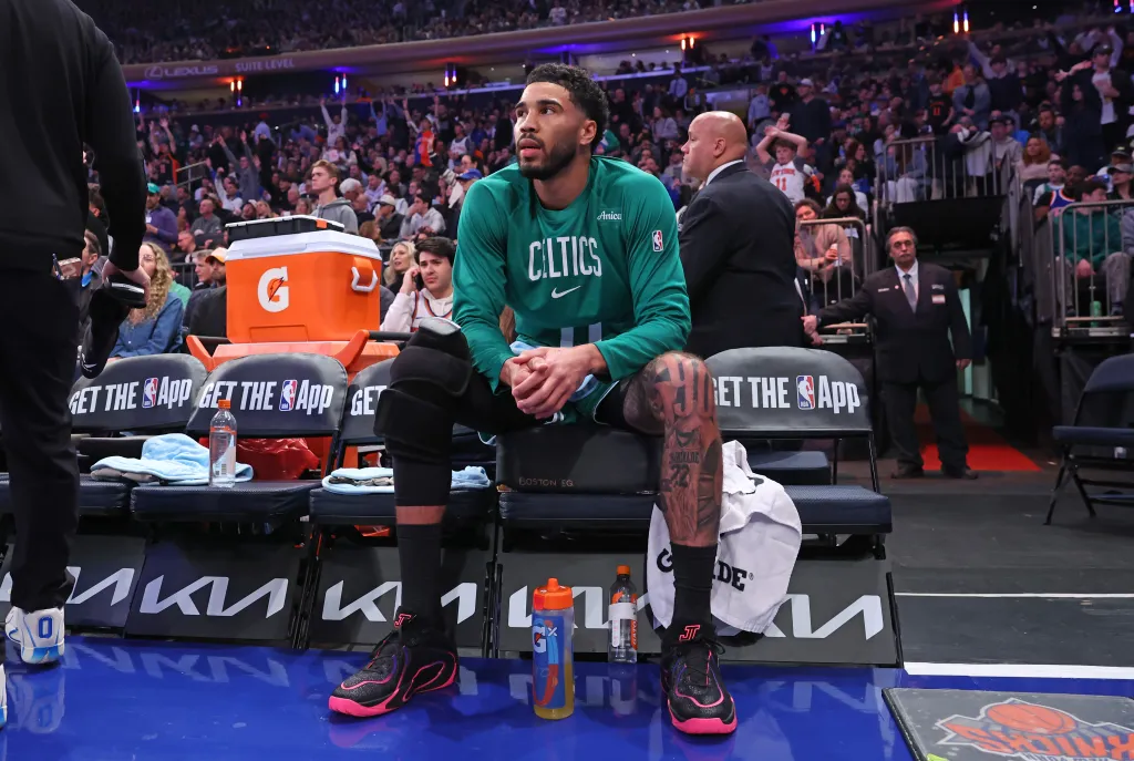 Jayson Tatum on the bench during the Boston Celtics vs. New York Knicks game.