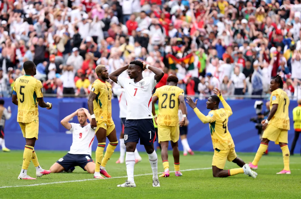 Bukayo Saka of England reacting to Harry Kane missing a chance during the FIFA World Cup 2026 match against Ghana.