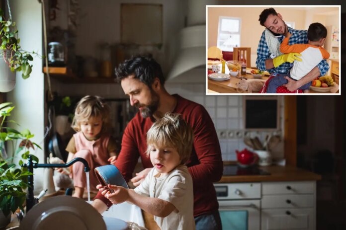 busy-father-looking-son-whilst-131585441.jpg