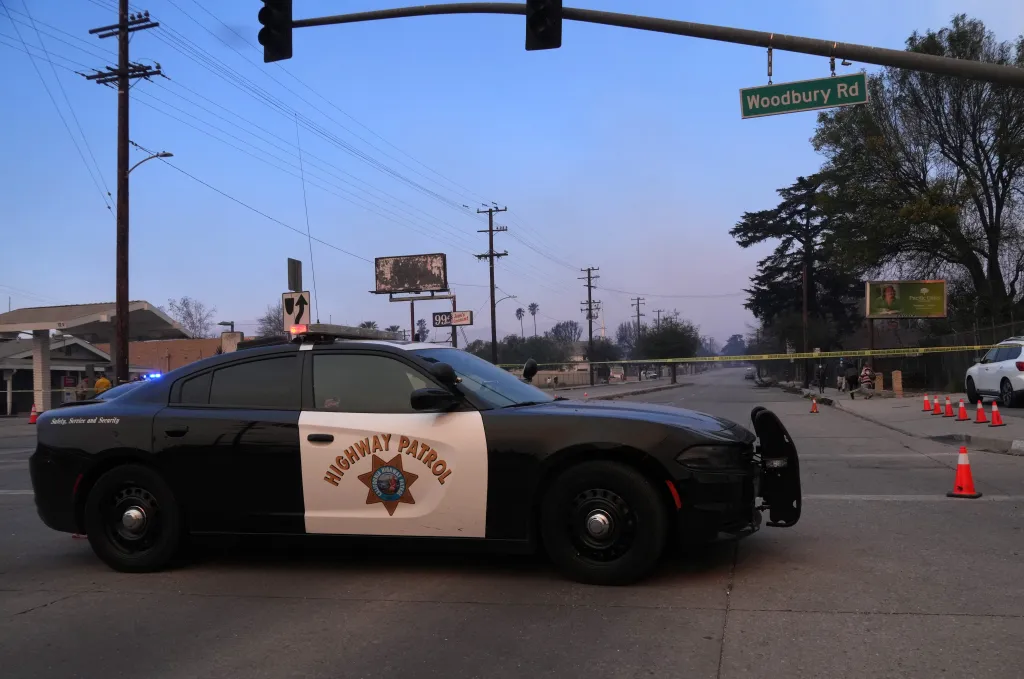 California Highway Patrol vehicle at a security checkpoint on Woodbury Ave. during the Eaton Fire.
