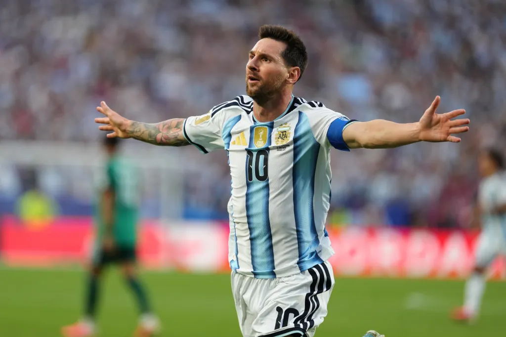 Lionel Messi celebrating a goal during a World Cup match.
