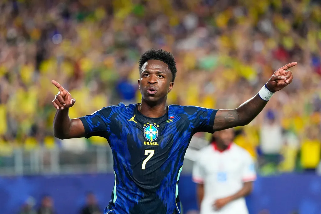 Vinicius Junior celebrates a goal for Brazil.