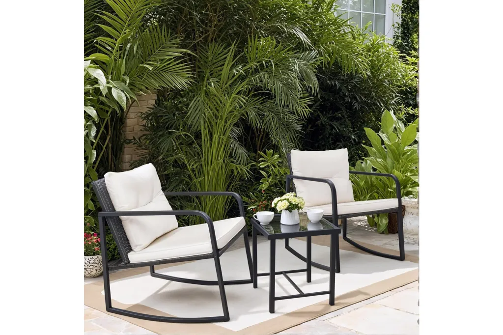 Three-piece patio set with rocking chairs and small table.