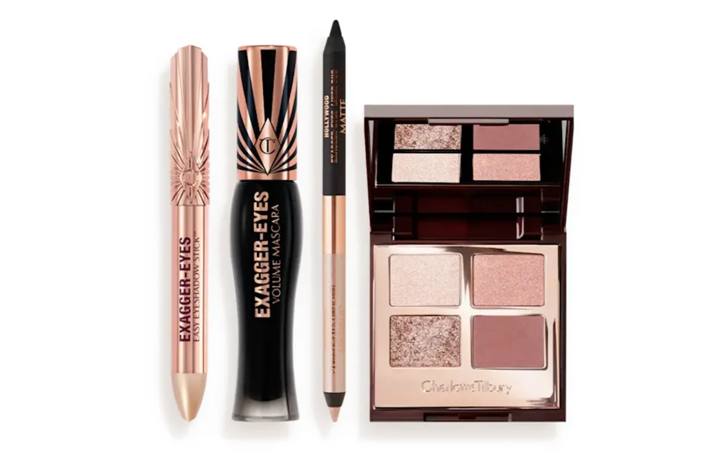 Charlotte Tilbury "Exagger-Eyes" collection, including an eyeshadow stick, mascara, eyeliner, and eyeshadow palette.