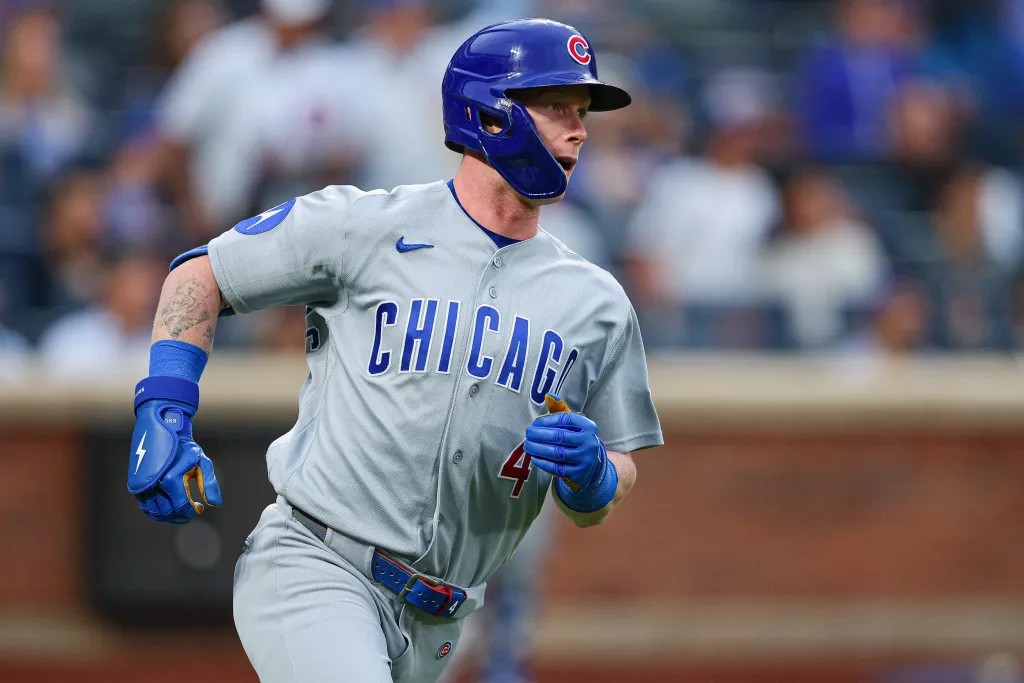 Chicago Cubs center fielder Pete Crow-Armstrong (4) rounds the bases after hitting a three-run home run.