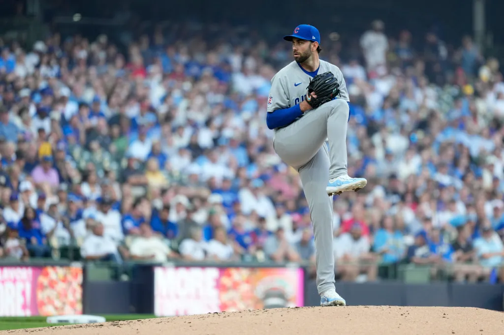 Chicago Cubs' David Peterson in his pitching motion on the mound.