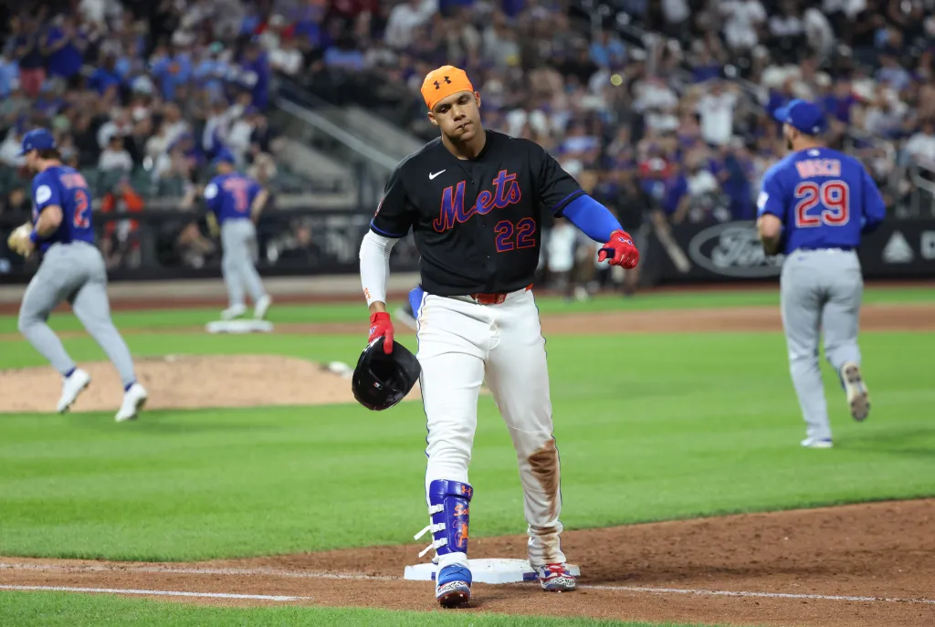 New York Mets left fielder Juan Soto #22 reacts after grounding out with the bases loaded at Citi Field.