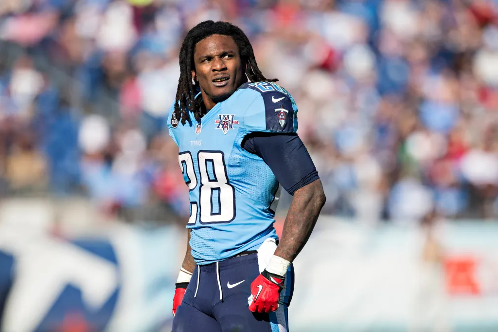 Tennessee Titans player wearing a light blue jersey with number 28, looking towards the right side of the frame.