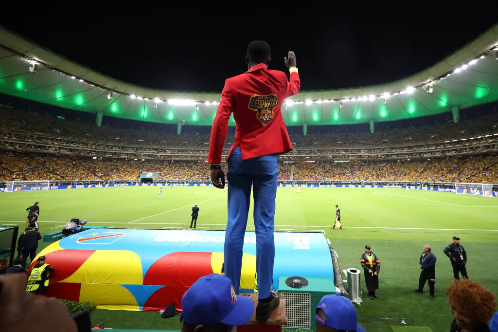 Congo DR fan Michel Nkuka Mboladinga, also known as Lumumba Vea, waves at the FIFA World Cup 2026 Group K match.
