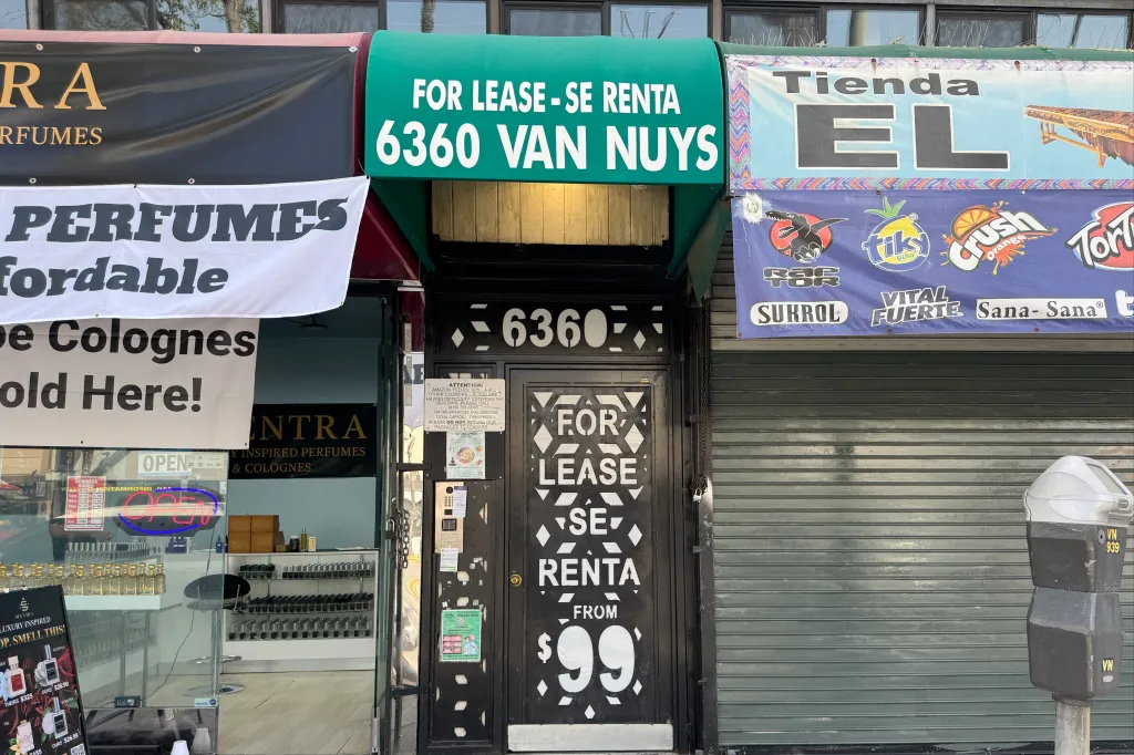 An empty storefront at 6360 Van Nuys with a "FOR LEASE" sign.