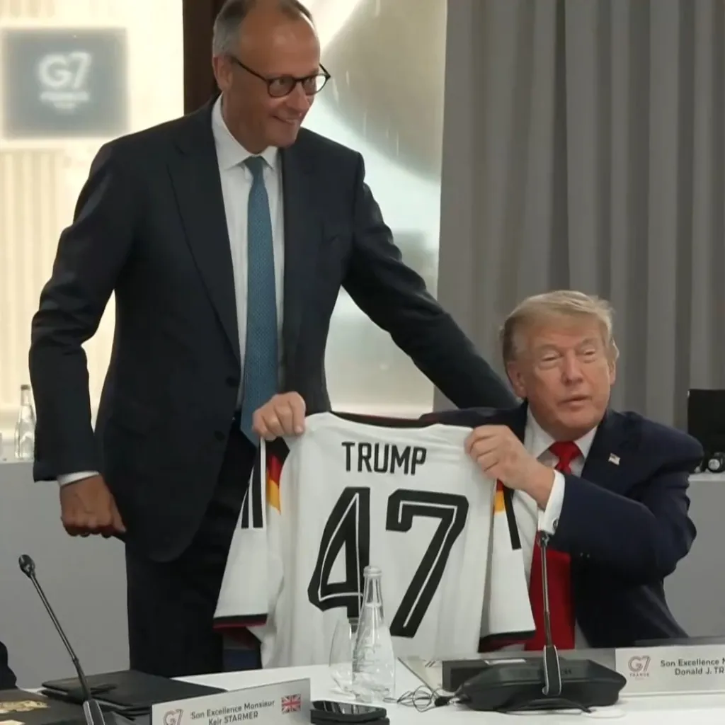 German Chancellor Friedrich Merz had a belated birthday gift for President Trump: a Germany soccer jersey with the number 47 on the back and "TRUMP" written on it.